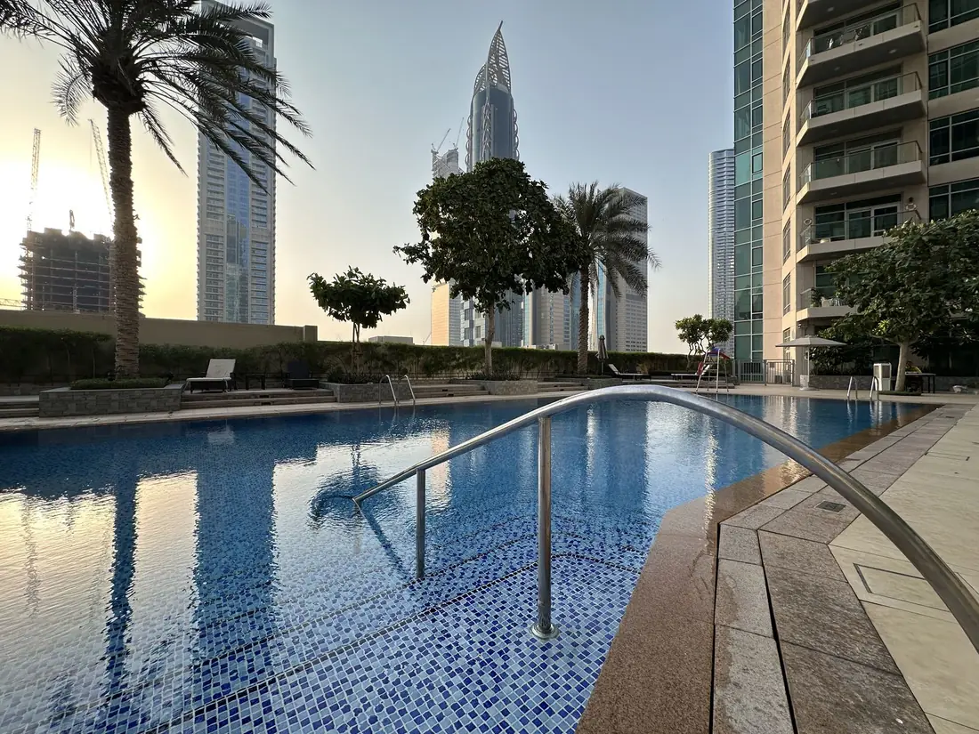 Residence pool at sunset in Dubai