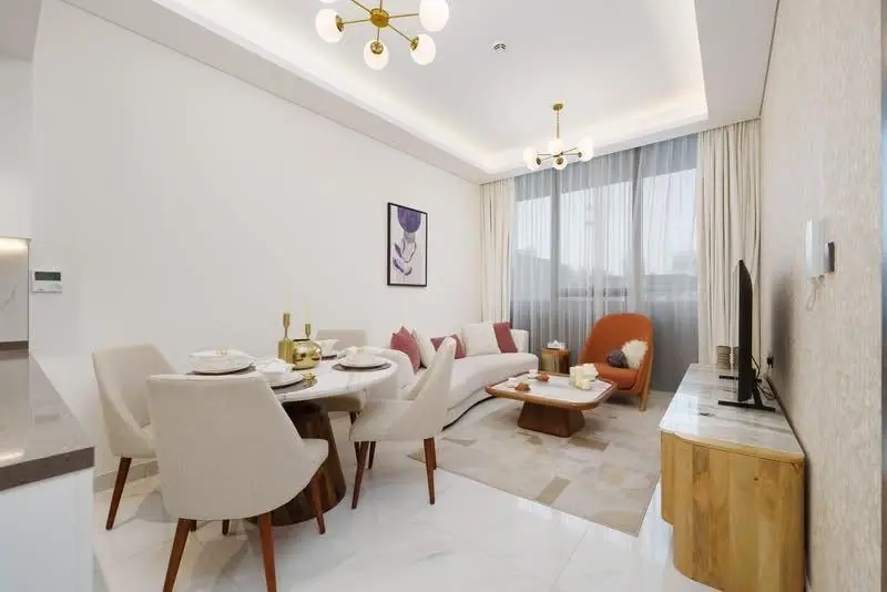 Living and dining room at Samana Park Views 1BR