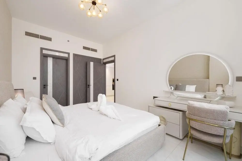 Bedroom with vanity at Samana Park Views 1BR
